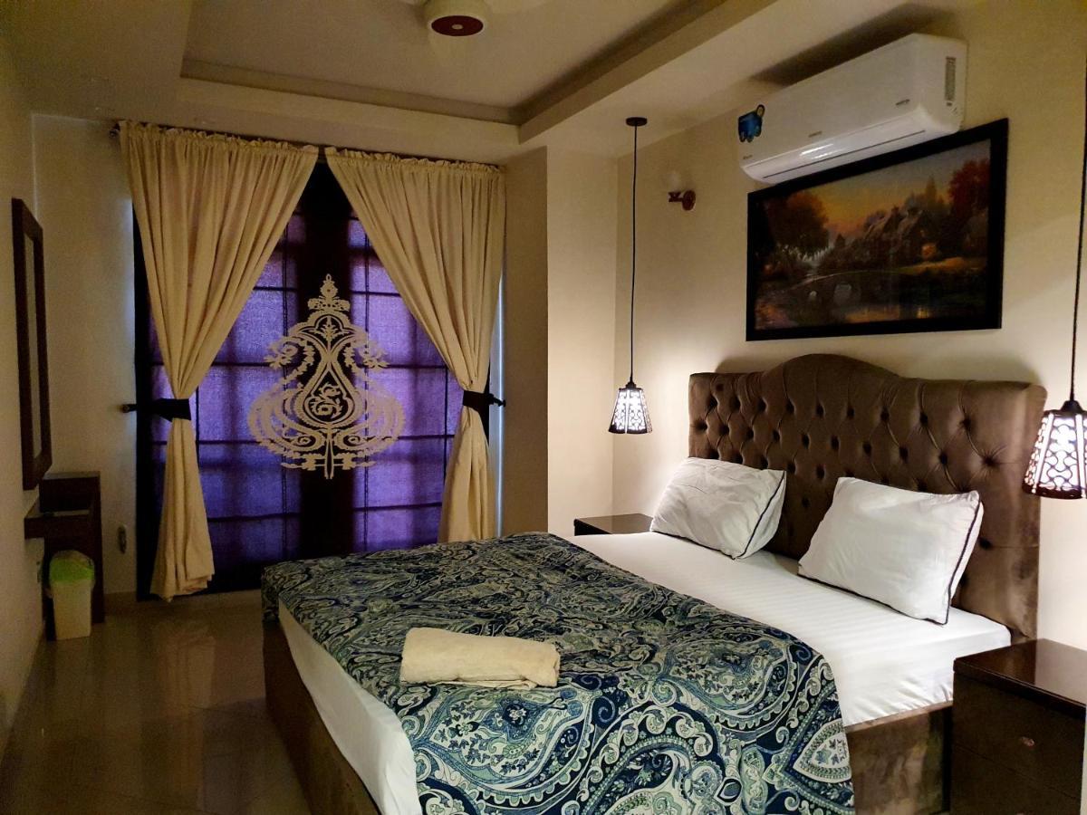 The Millenial Apartments & Suites Bahria Town Равалпінді Екстер'єр фото