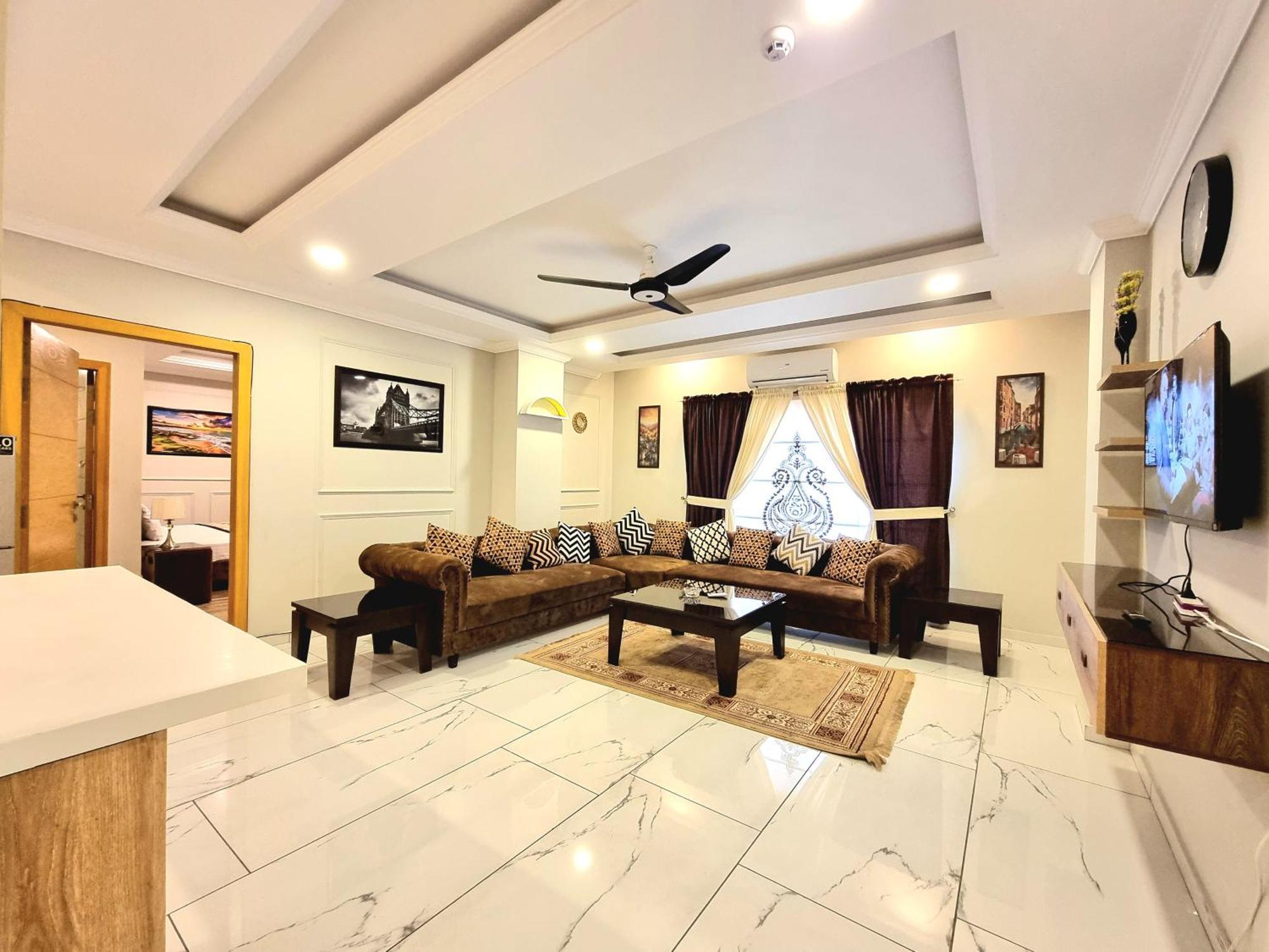 The Millenial Apartments & Suites Bahria Town Равалпінді Номер фото