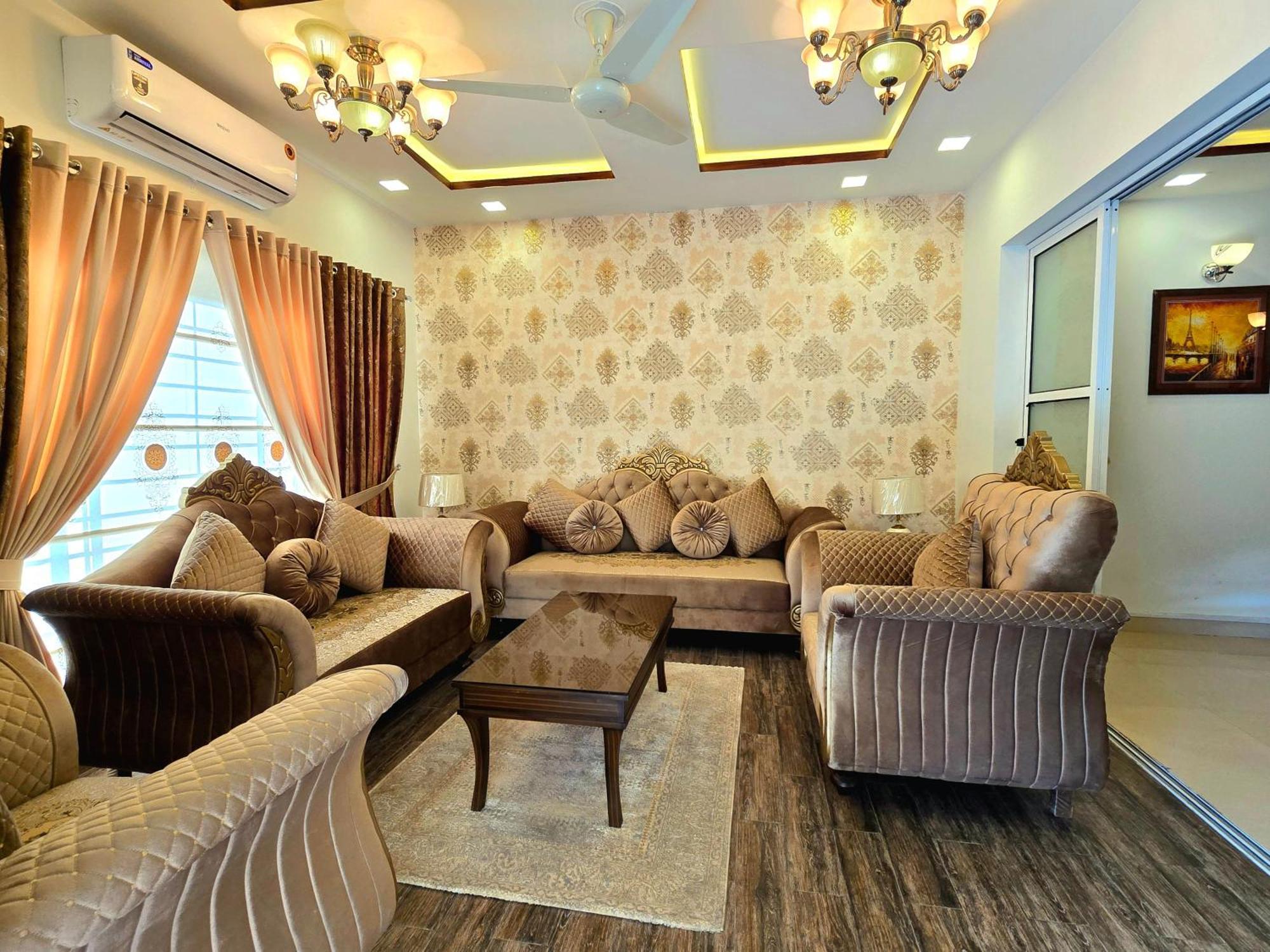 The Millenial Apartments & Suites Bahria Town Равалпінді Номер фото