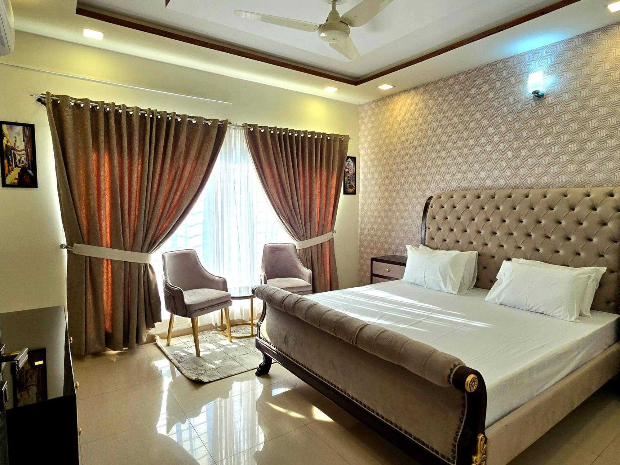 The Millenial Apartments & Suites Bahria Town Равалпінді Номер фото